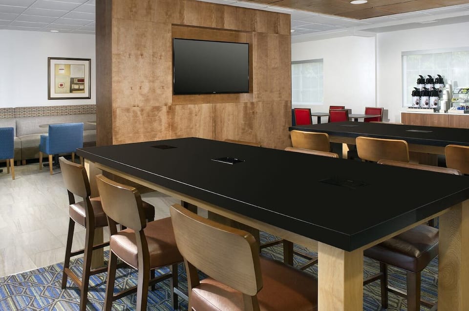 Gather and unwind in the stylish lounge with ample seating.