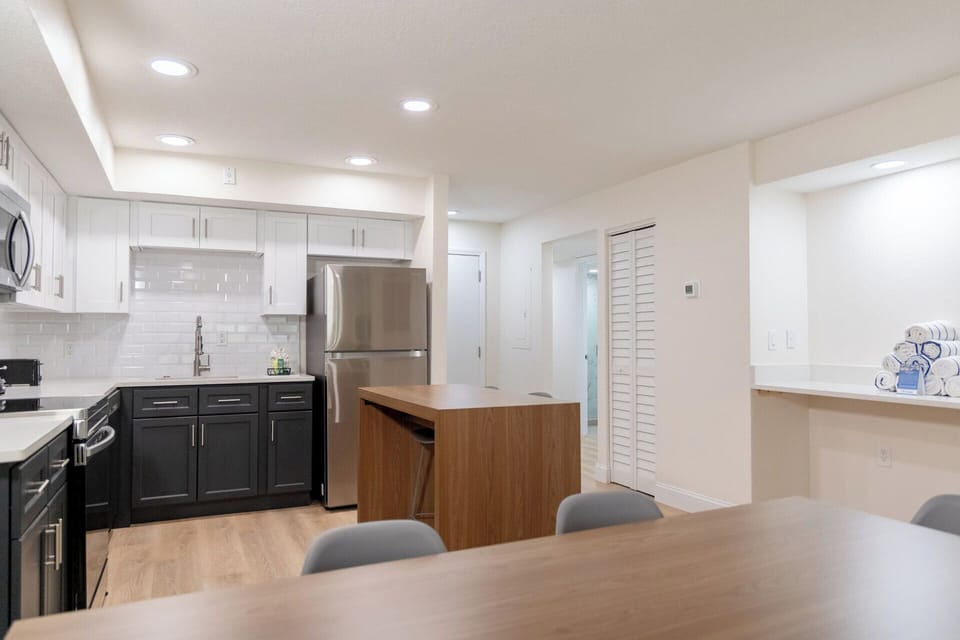 Gather for easy meals in this bright, modern kitchen.