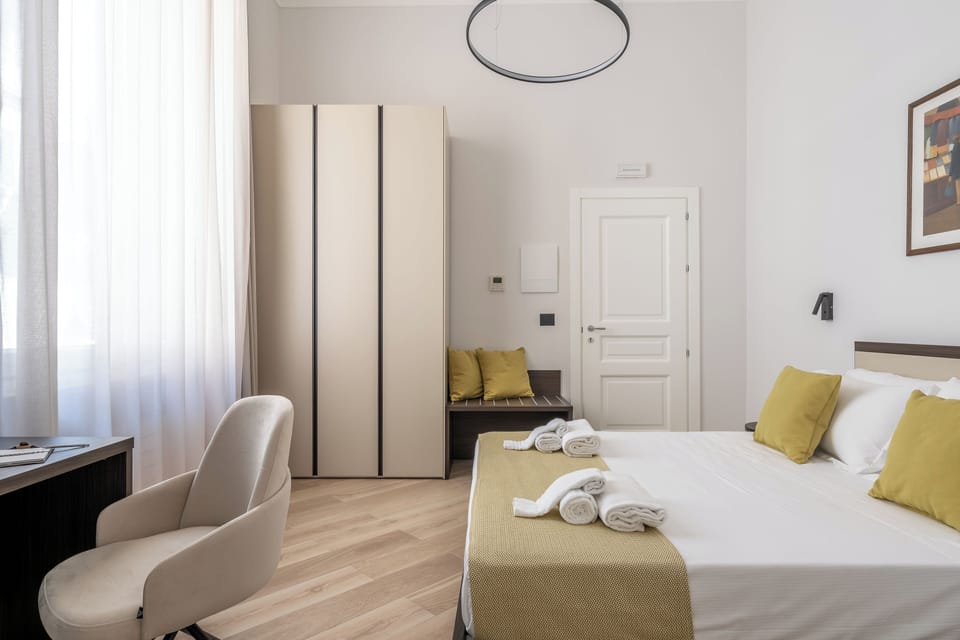 Deluxe Quadruple Room | Desk, laptop workspace, free WiFi