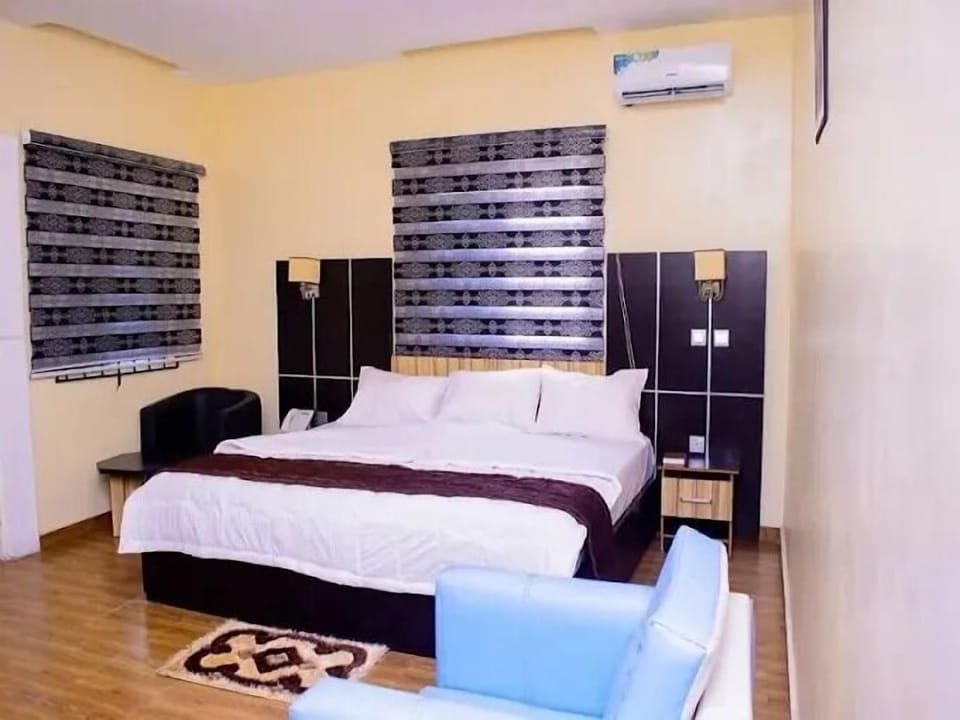 Deluxe Apartment, Balcony, City View | Desk, laptop workspace, blackout drapes, soundproofing