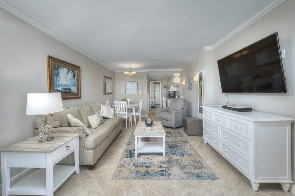 Deluxe Condo, 1 Bedroom, Balcony, Oceanfront (202) | Living area | TV, DVD player