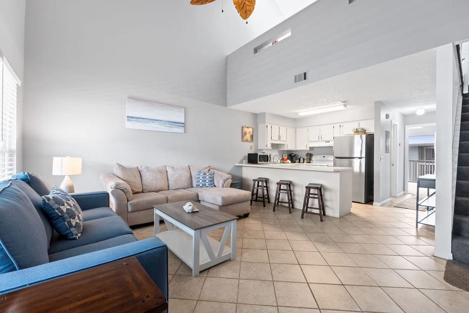 The open floor plan connects effortlessly to the kitchen, making it easy to entertain or enjoy meals together.