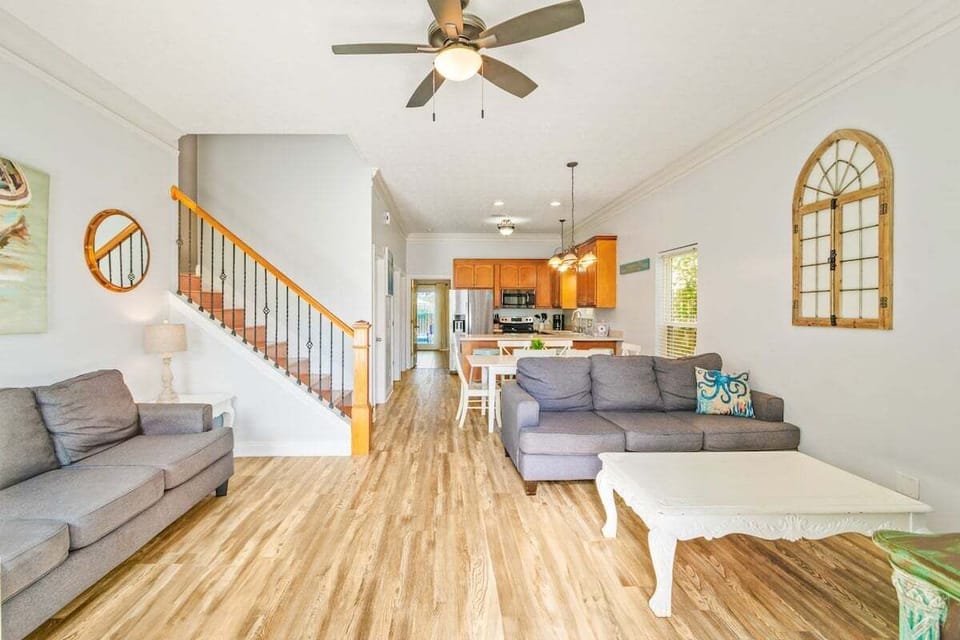 Step inside this coastal retreat and feel instantly at home in the spacious, open-concept living area, designed for relaxation and togetherness.