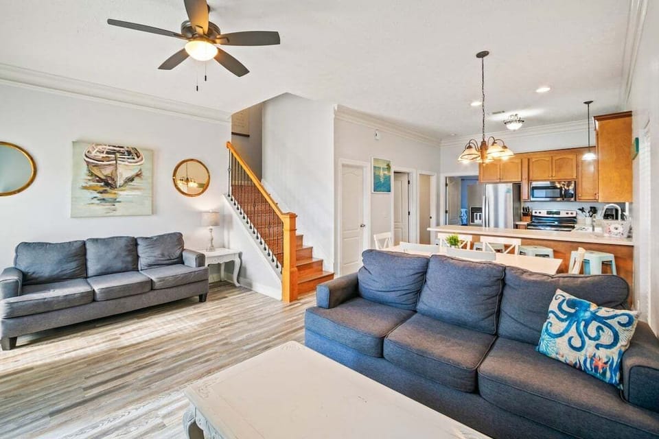 From the moment you step inside, you're greeted by a bright, open floorplan that effortlessly blends living, dining, and kitchen areas into one welcoming space.