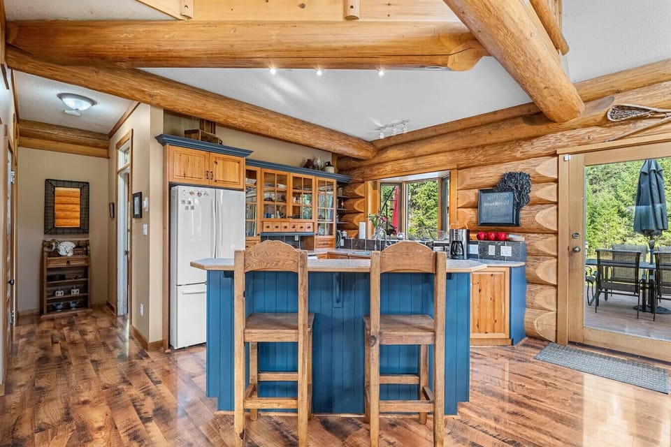 Full kitchen with a drip coffee maker, Nespresso machine, blender, crockpot, and basic condiments (sugar, coffee, tea, ketchup, mustard & relish.)