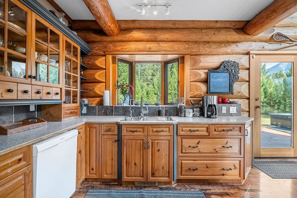 Full kitchen with a drip coffee maker, Nespresso machine, blender, crockpot, and basic condiments (sugar, coffee, tea, ketchup, mustard & relish.)