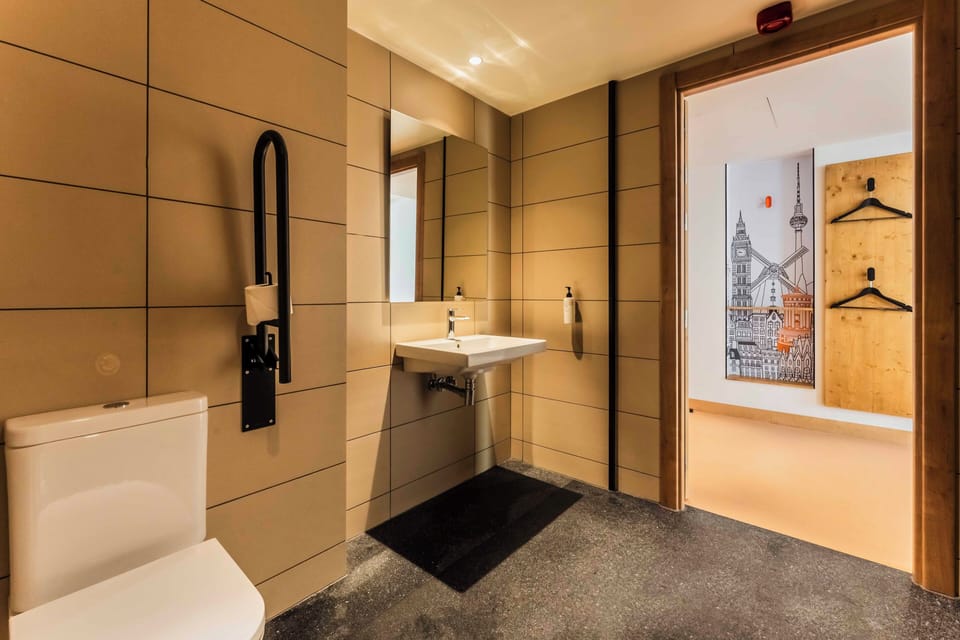 Accessible Double Room | Bathroom | Shower, eco-friendly toiletries, towels, soap