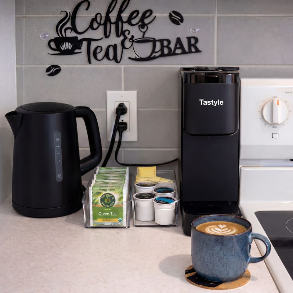 Fully equipped coffee & tea station with complimentary selections.