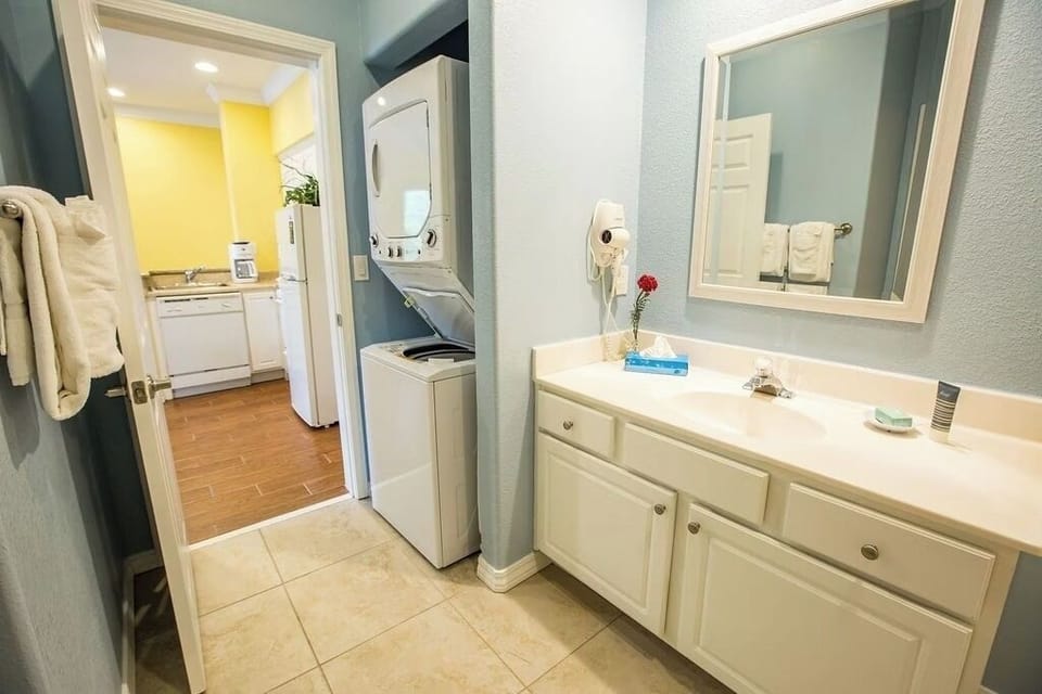 Refresh easily with handy vanity and in-unit laundry.