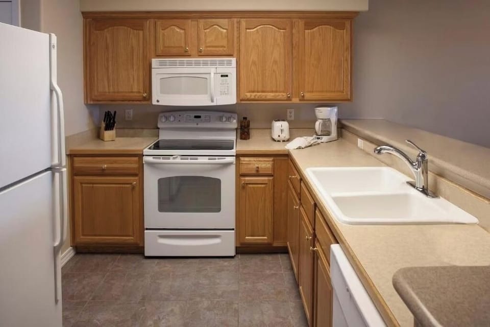 Prepare family favorites in a full kitchen with plenty of storage.