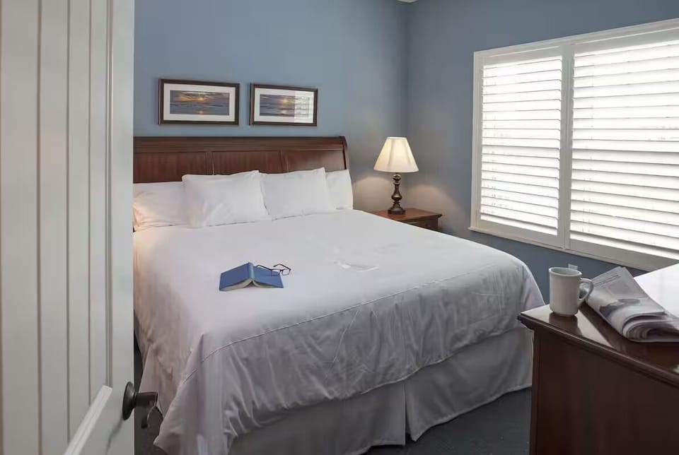 Unwind in crisp linens for a deeply restful night.