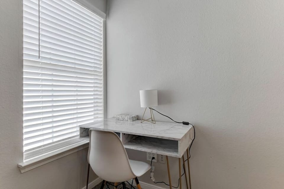 Desk workspace w/ chair, perfect for focused tasks or planning