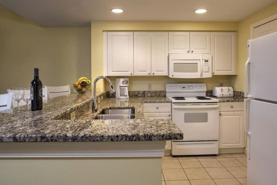 Cook with ease on generous counters and full-size appliances.