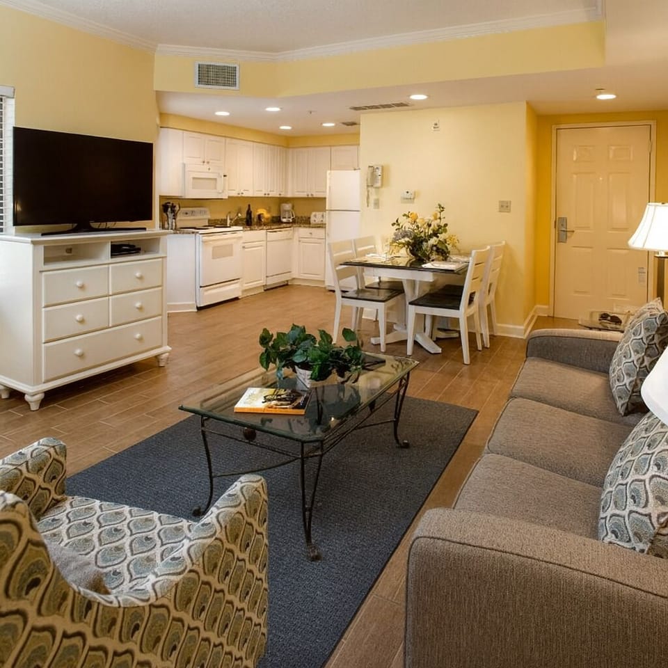 Gather comfortably in the spacious living room and open layout.
