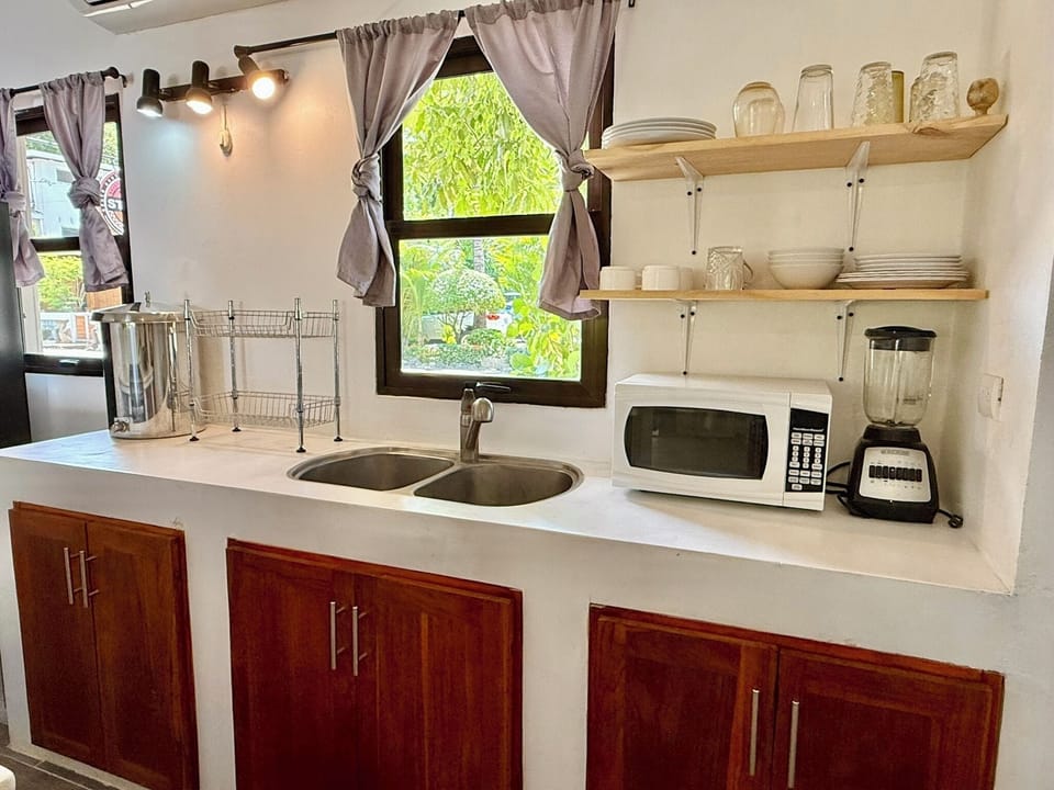 Queen Bed, Patio and Garden View | Private kitchen | Full-size fridge, microwave, oven, stovetop