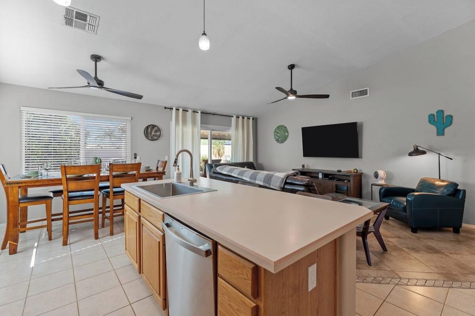 With ample seating and a stylish ambiance, this space is perfect for enjoying home-cooked meals or takeout from local eateries.
