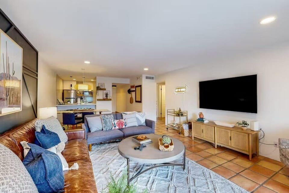 Living Room with cozy furnishings, TV, Patio access