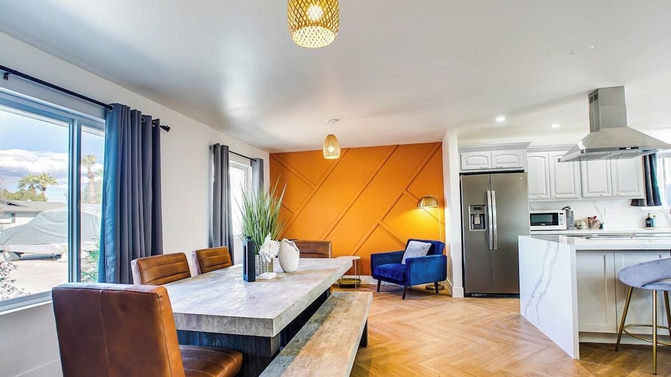 Dining Table with Orange Wall, Seating Area