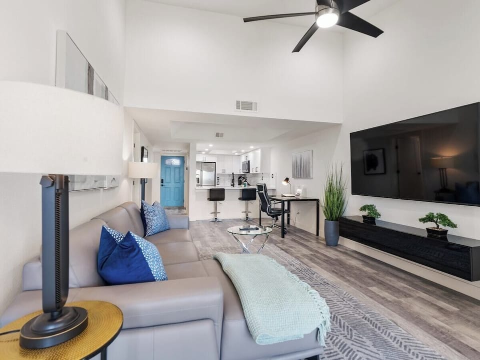 Living Room with Sectional, Desk & Smart TV
