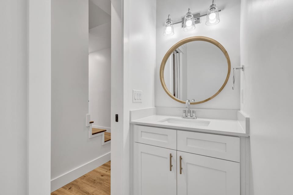 Half Bathroom adjacent to the kitchen
