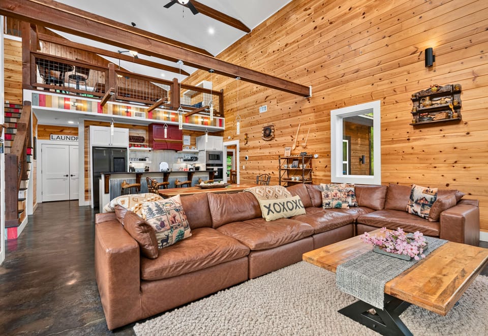 From the comfortable seating to the open layout connecting the kitchen and dining area, this inviting space was designed for spending time together.