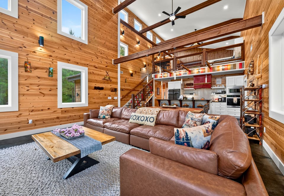 Whether you're catching up with family or settling in for a movie night, this spacious great room offers plenty of comfortable seating for everyone.