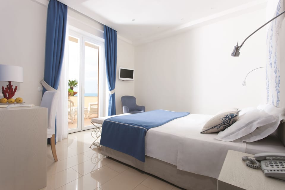 Executive Double or Twin Room, Terrace, Sea View | Premium bedding, minibar, in-room safe, individually decorated