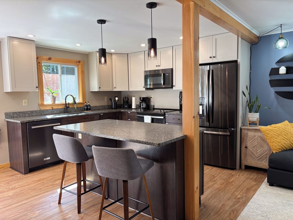 Large kitchen with two island stools