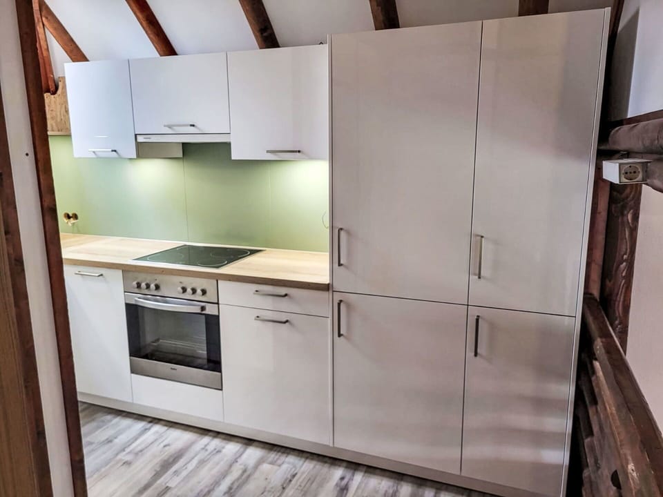 Flooring, Wood, Floor, Furniture, Interior Design, Kitchen, Cabinetry, Countertop, Kitchen Appliance, Cupboard