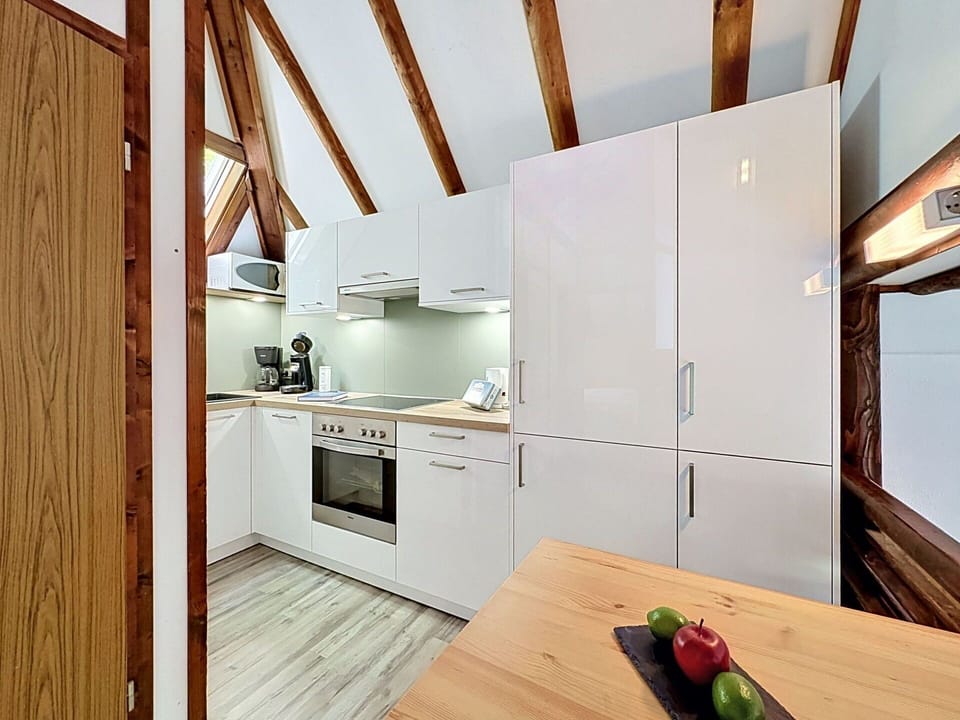 Wood, Flooring, Interior Design, Floor, Ceiling, Kitchen, Wood Flooring, Room, Attic, Countertop