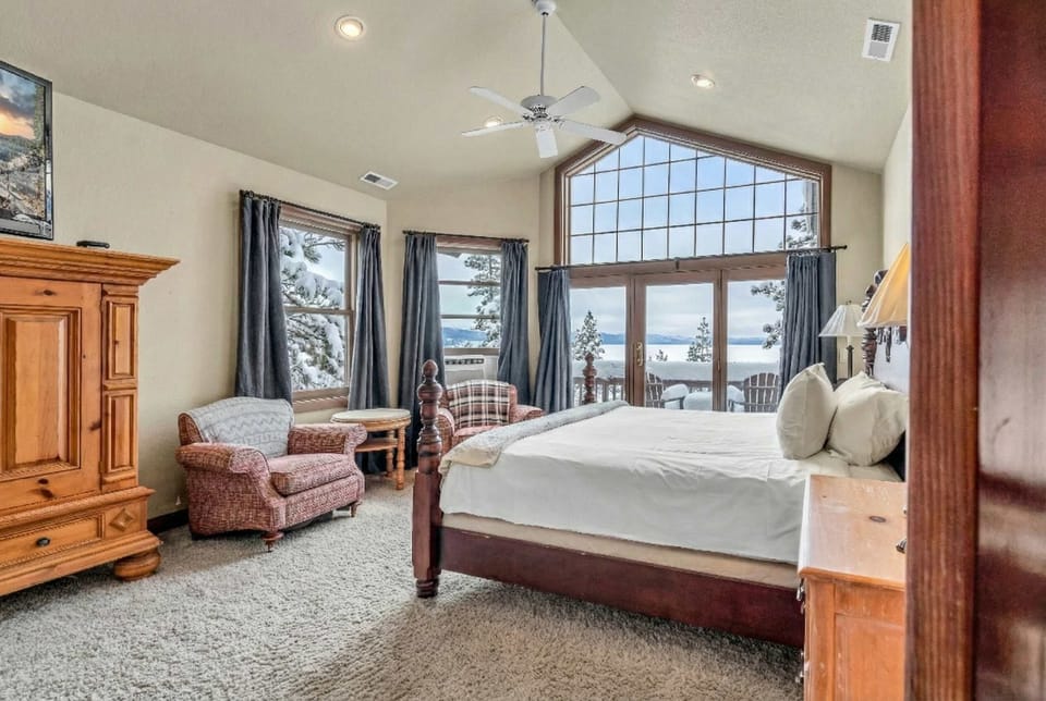 Bedroom 4 (upper floor): King bed, Juliette balcony, Roku TV, en-suite bathroo