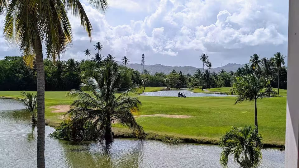 Golf course views. Here you can see some golfers in the background.