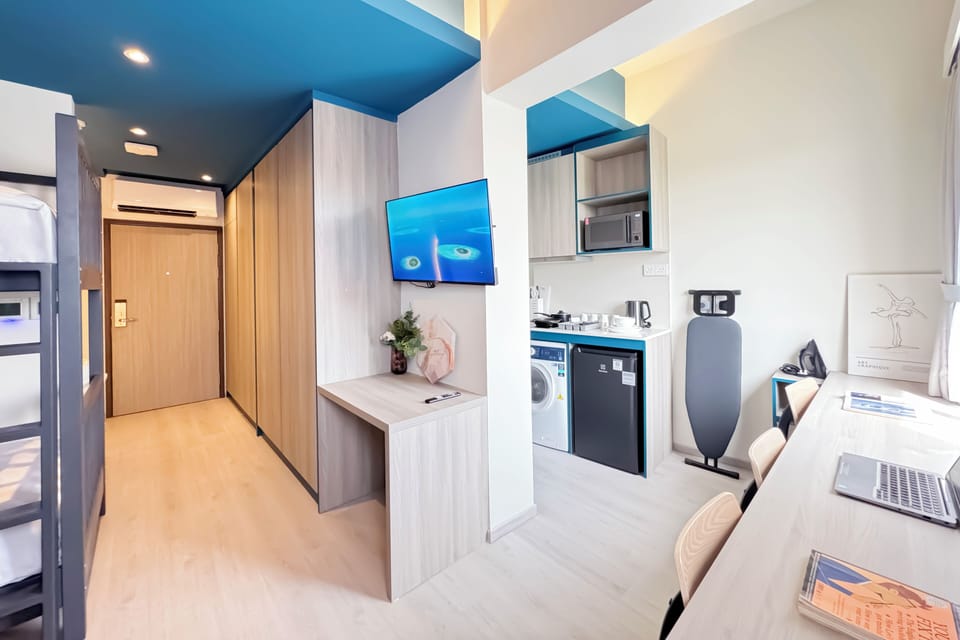 Family Quadruple Room | In-room safe, desk, blackout drapes, iron/ironing board