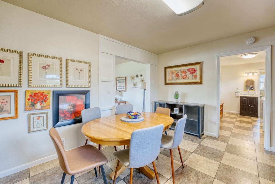 Elevate your dining experience in this stylish rental with a beautiful table and cozy chairs. Perfect for gatherings or intimate meals! 