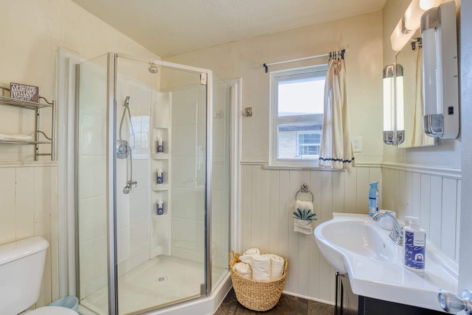 Upgrade your daily routine with this stylish bathroom featuring a sleek shower and modern sink. 🛁✨ Perfect for a refreshing start to your day!
