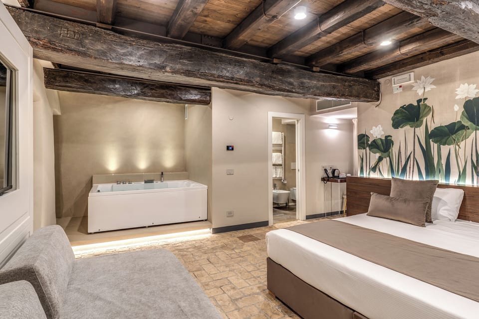 Triple with whirlpool tub mezzanine floor | Minibar, in-room safe, desk, laptop workspace