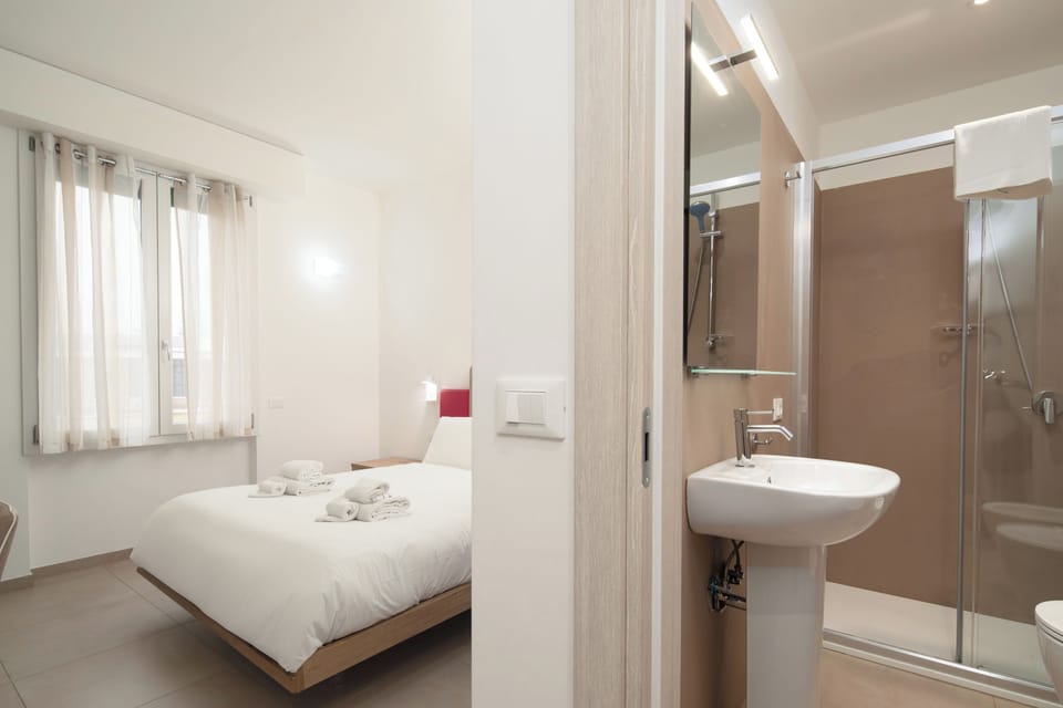 Classic Double Room | Minibar, in-room safe, desk, blackout drapes