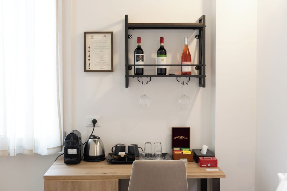 Deluxe Double Room | Minibar, in-room safe, desk, blackout drapes