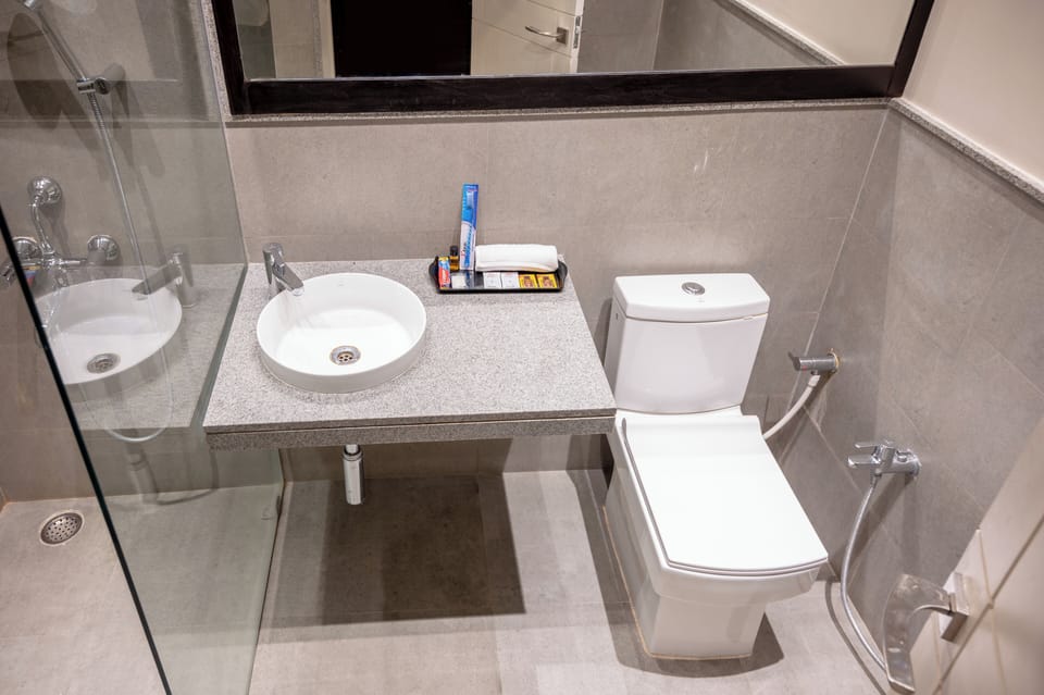 Shower, free toiletries, hair dryer, slippers