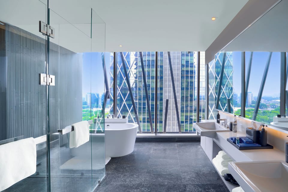 Premium Double Room, City View | Bathroom | Hair dryer, slippers, towels, soap