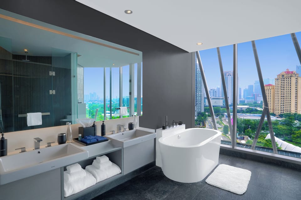 Executive Double Room, City View | Bathroom | Hair dryer, slippers, towels, soap
