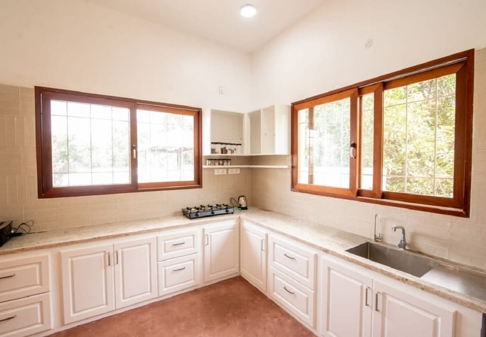 Luxury Villa, 4 Bedrooms, Garden View | Private kitchenette | Mini-fridge, toaster, dining tables
