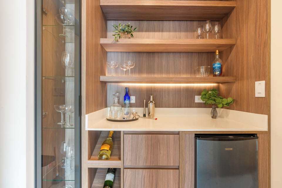 Convenient coffee station and minibar for your morning essentials.