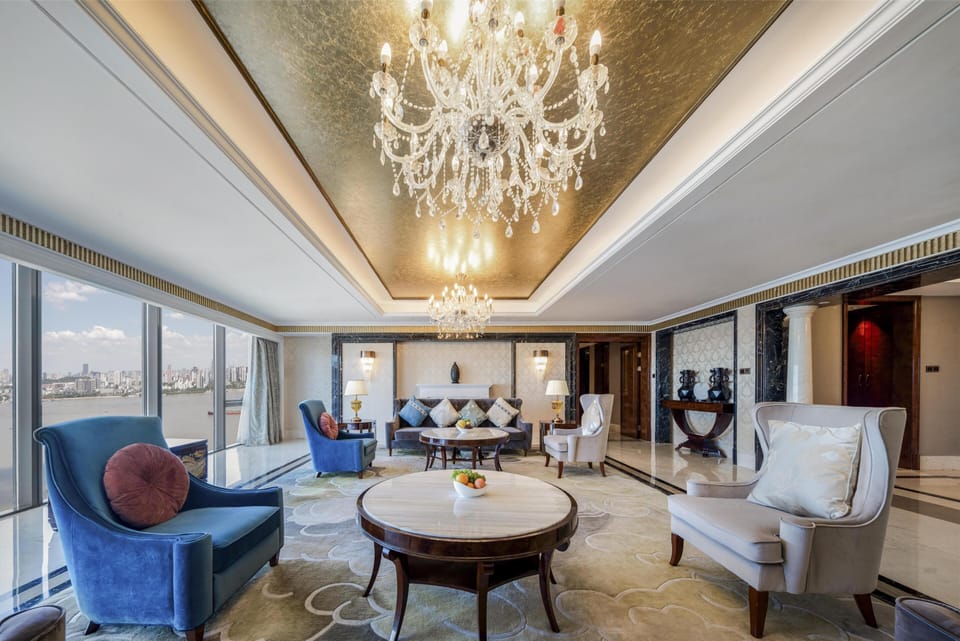 Presidential Suite, 1 King Bed | Living area | 42-inch LCD TV with satellite channels, TV, DVD player