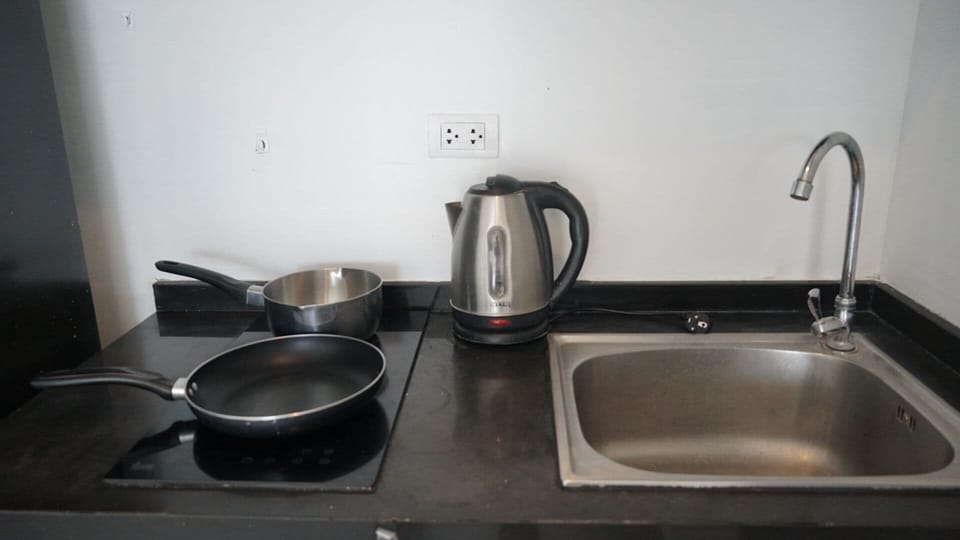 Fridge, microwave, stovetop, cookware/dishes/utensils