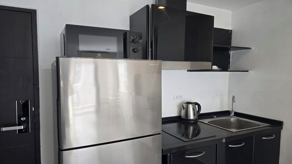 Fridge, microwave, stovetop, cookware/dishes/utensils
