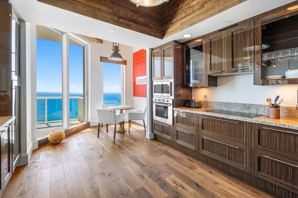 Kitchen with 12 ft. ceiling and endless ocean views from the Penthouse