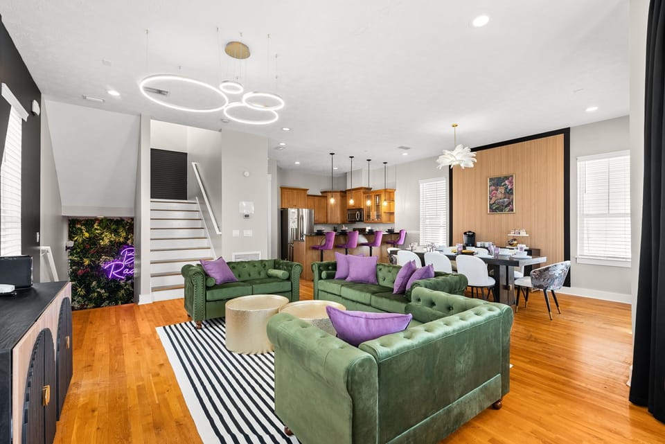 Purple pops and open-plan living — a cheerful, spacious area that brings the whole group together.