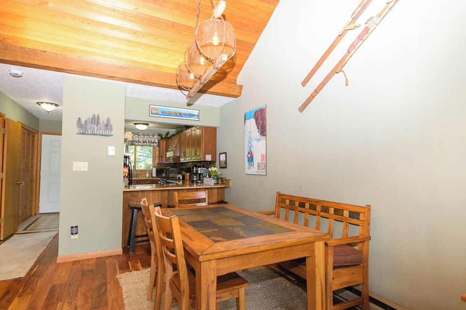 Dining table for 6 plus breakfast bar with stools with 3 additional seats 