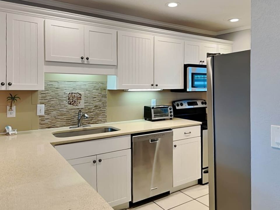 Condo, Multiple Beds, Hot Tub, Ocean View (Hibiscus B203) | Private kitchen | Coffee/tea maker